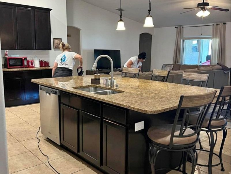 Nada's Cleaning team turning over an open kitchen and living space