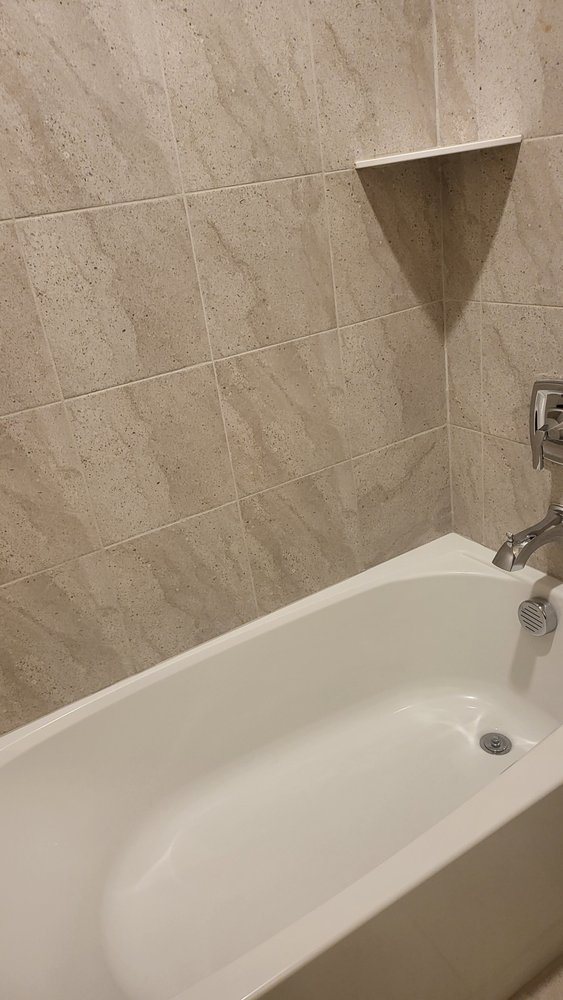Clean bathroom tile and tub detail