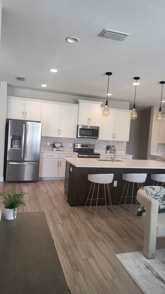 Clean, organized kitchen with island seating